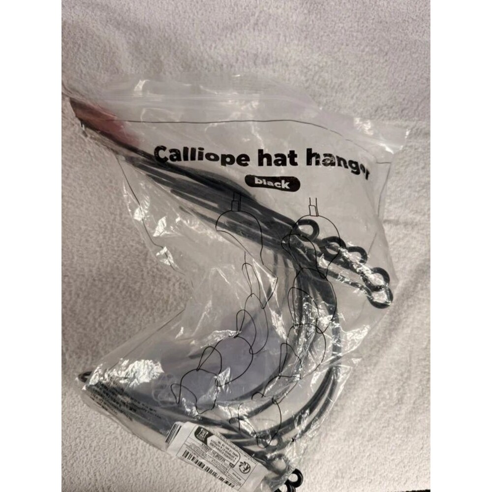 Black metal chain-style hat rack and storage hanger